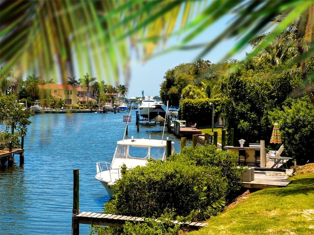 view of dock with a water view