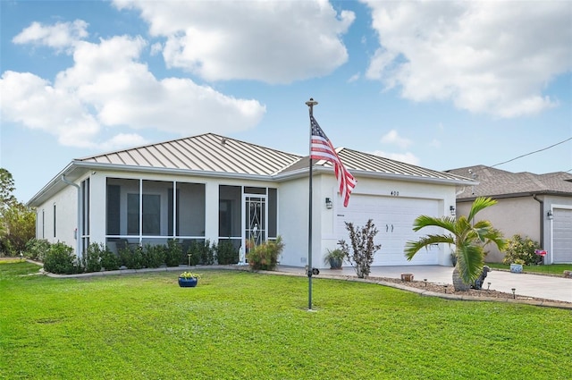 ranch-style house with a sunroom, a garage, and a front yard