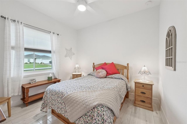 bedroom featuring ceiling fan and hardwood / wood-style floors