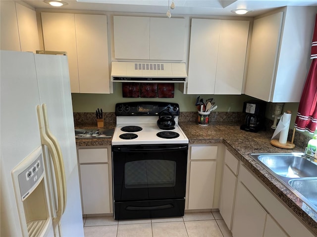 kitchen with white cabinetry, white appliances, and range hood