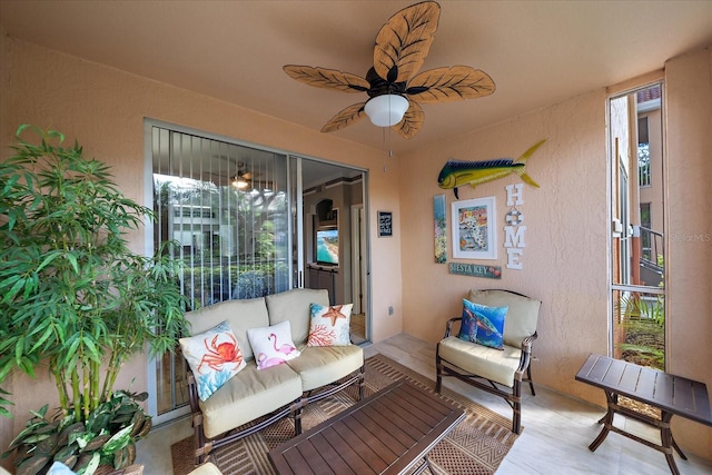 view of patio featuring ceiling fan