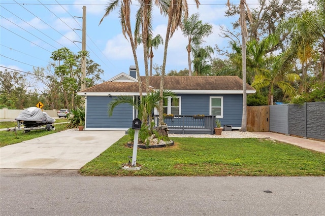 single story home with a front lawn