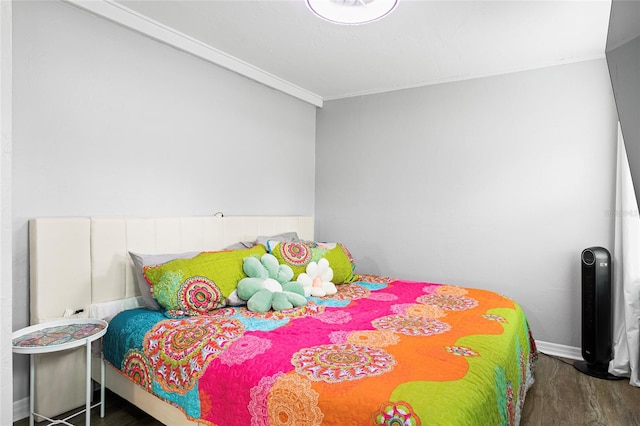 bedroom featuring hardwood / wood-style floors