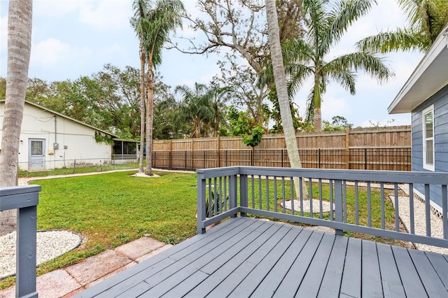 wooden deck with a yard