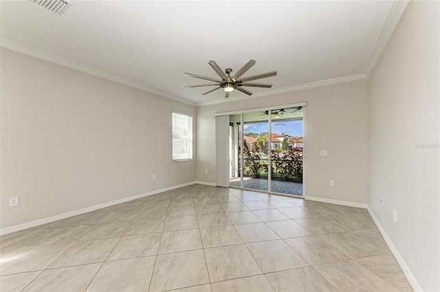 tiled spare room featuring ceiling fan, a healthy amount of sunlight, and crown molding