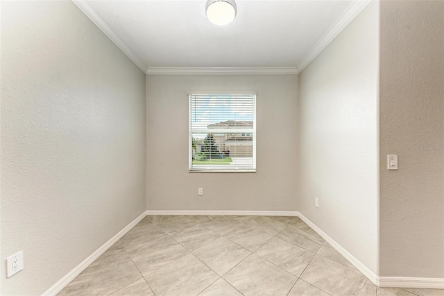 unfurnished room with light tile patterned floors and ornamental molding