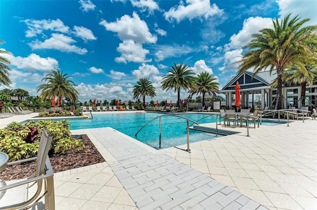 view of pool featuring a patio