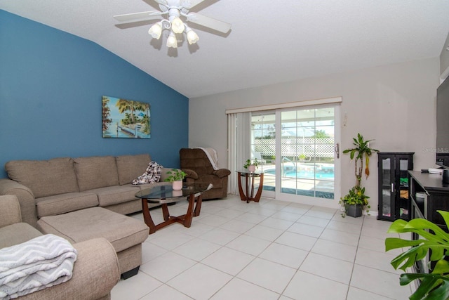 tiled living room with lofted ceiling, a textured ceiling, and ceiling fan