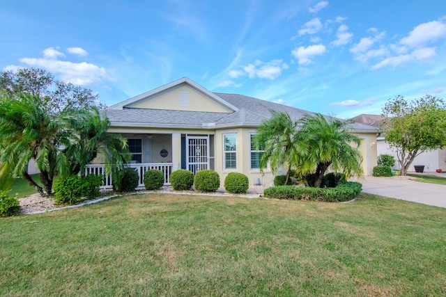 view of front of house with a porch and a front lawn