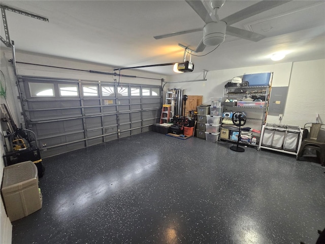 1953 Wheeling Ave, North Port, FL 34288 - garage featuring a garage door opener and ceiling fan