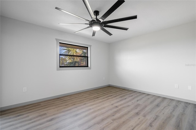 unfurnished room with ceiling fan and light hardwood / wood-style floors