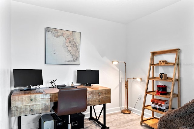 office space featuring light wood-type flooring