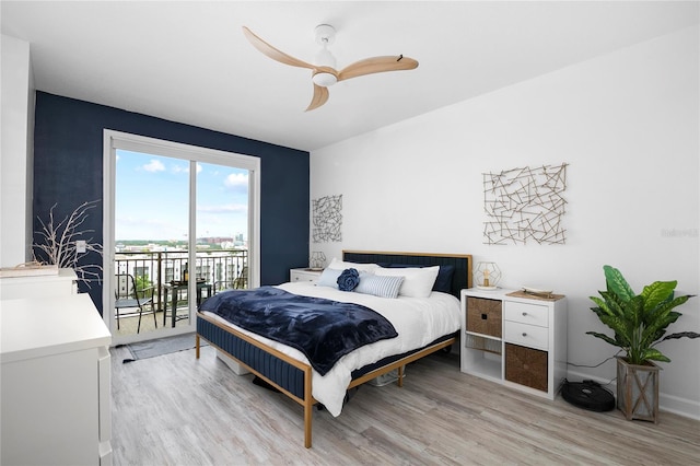 bedroom featuring access to outside, ceiling fan, and light hardwood / wood-style floors