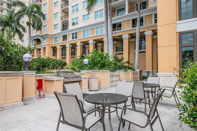 view of patio featuring a grill and exterior kitchen