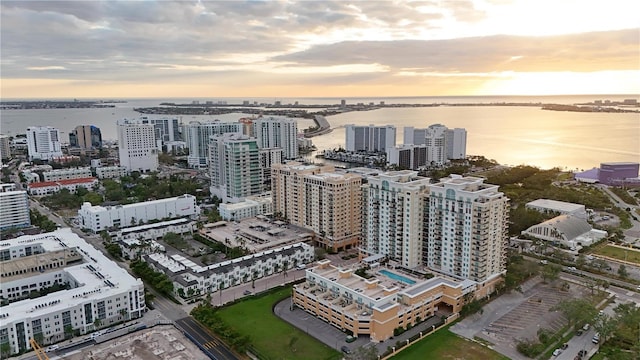 aerial view at dusk with a water view