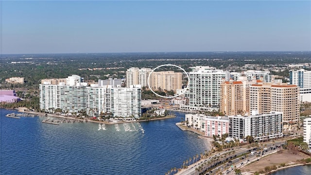 birds eye view of property featuring a water view