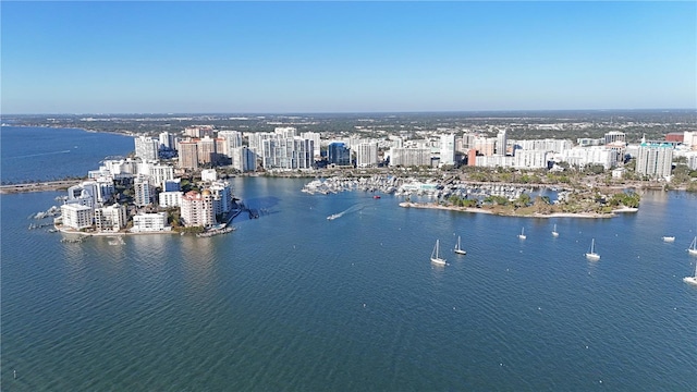 drone / aerial view featuring a water view