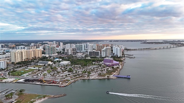 aerial view at dusk with a water view