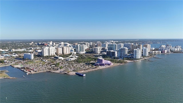 birds eye view of property featuring a water view