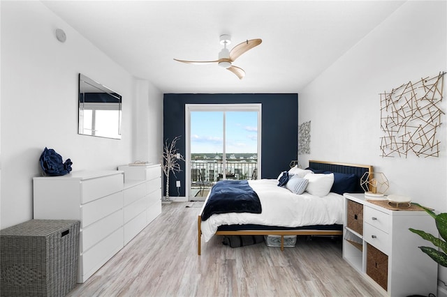 bedroom featuring ceiling fan, access to outside, and light hardwood / wood-style flooring