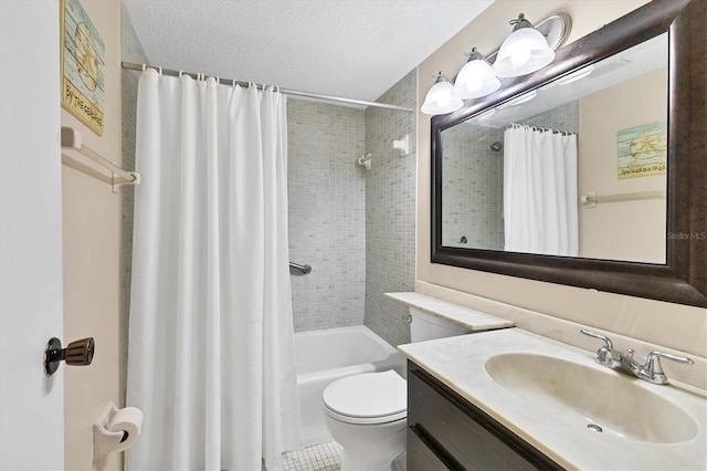 full bathroom with vanity, shower / tub combo, a textured ceiling, and toilet