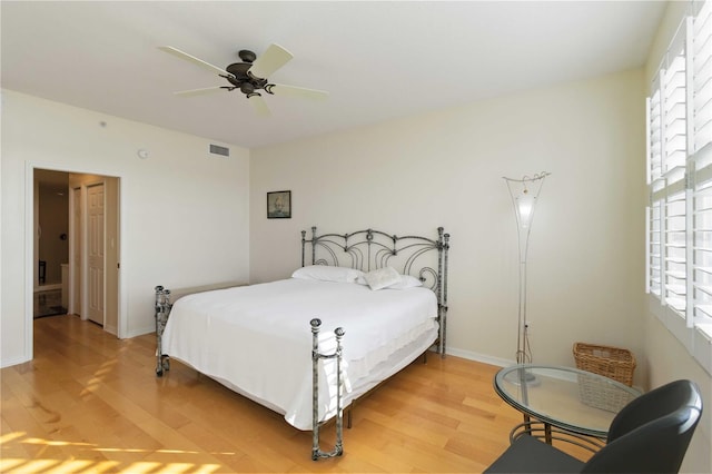 bedroom featuring wood-type flooring and ceiling fan