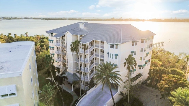 view of property with a water view