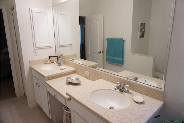 bathroom with vanity and tile patterned flooring