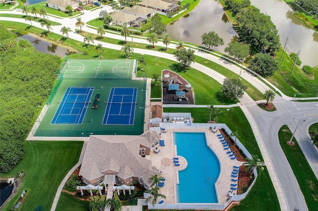 birds eye view of property featuring a water view