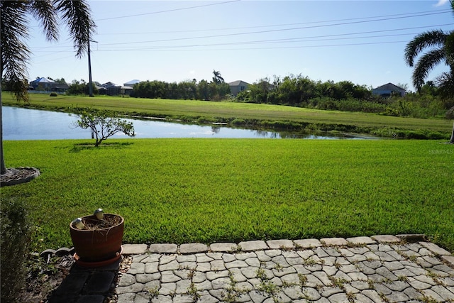 view of yard with a water view