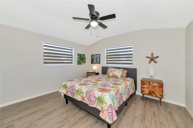 bedroom featuring wood-type flooring, ceiling fan, and lofted ceiling