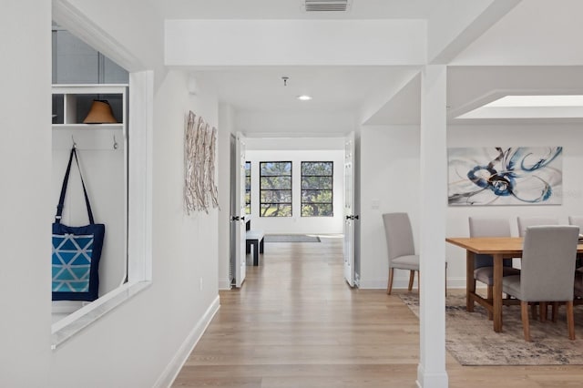 hall featuring light hardwood / wood-style floors