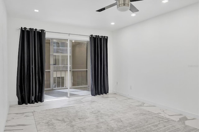 empty room featuring ceiling fan