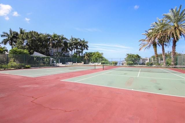 view of sport court with basketball hoop