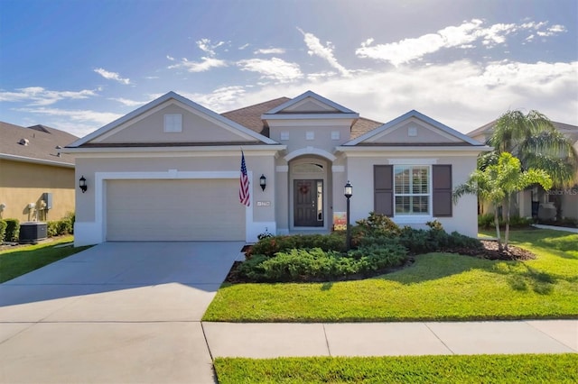 ranch-style house with a garage and a front lawn