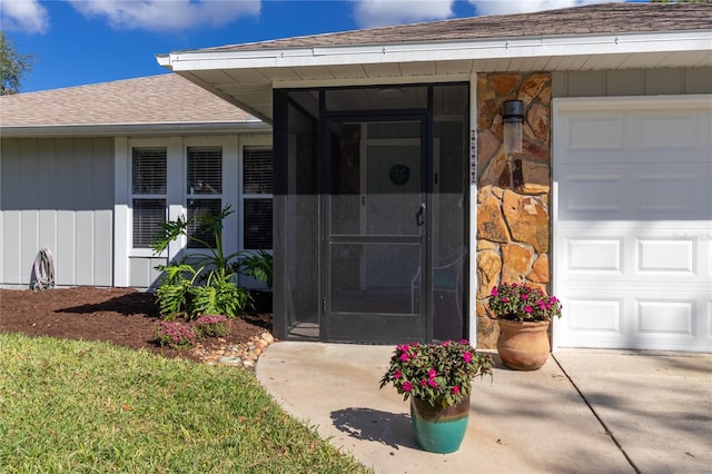 entrance to property featuring a garage