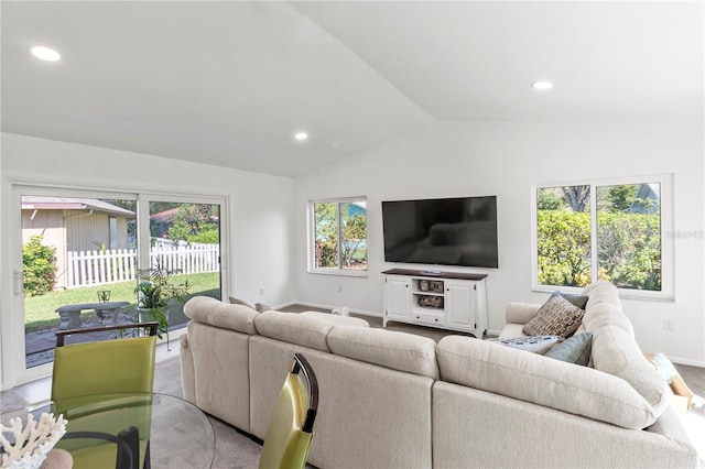 living room with light carpet and vaulted ceiling