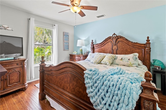 bedroom featuring ceiling fan and hardwood / wood-style flooring