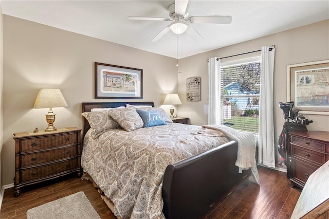 bedroom featuring ceiling fan and dark wood-type flooring