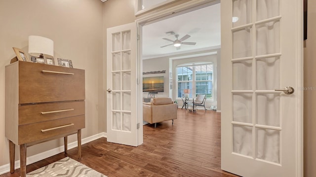 interior space featuring ornamental molding, french doors, and hardwood / wood-style flooring