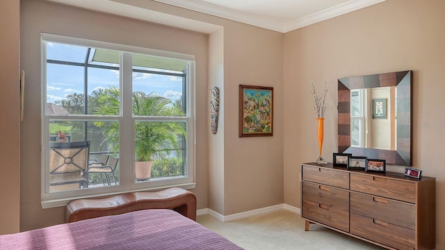 bedroom featuring light colored carpet and crown molding