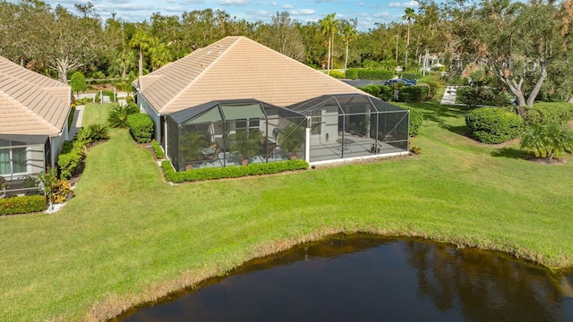 drone / aerial view with a water view