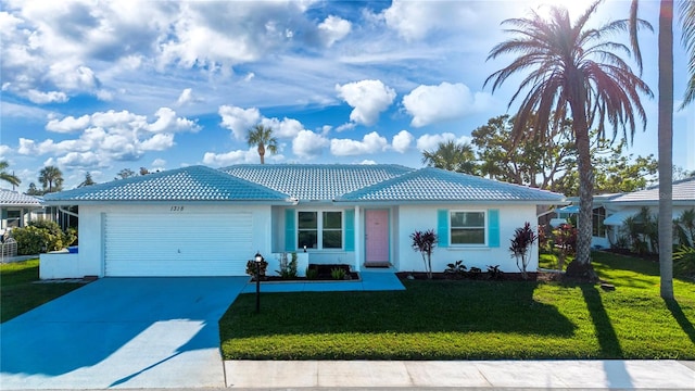 single story home with a garage and a front lawn