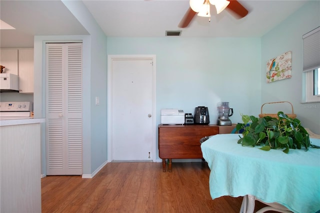 bedroom featuring light hardwood / wood-style flooring and ceiling fan