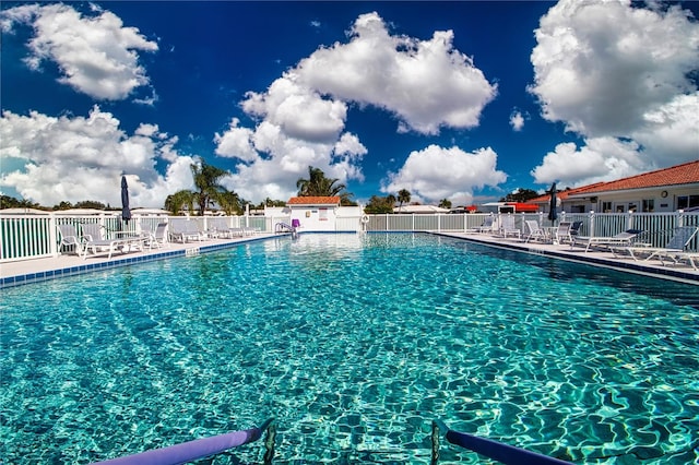 view of swimming pool featuring a patio