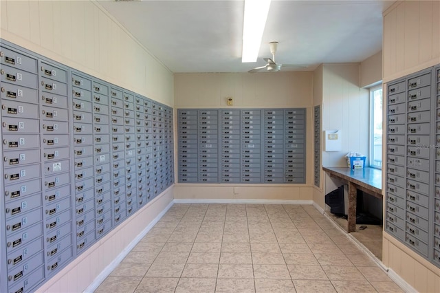 surrounding community featuring ceiling fan and a mail area