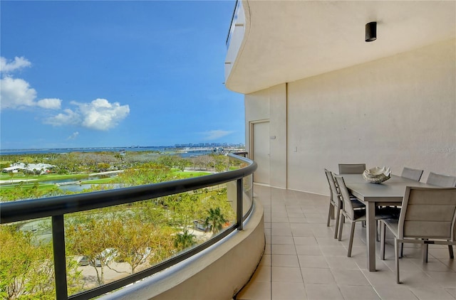 balcony featuring a water view