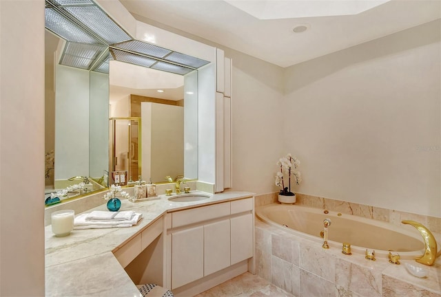 415 L Ambiance Dr Unit C703, Longboat Key, FL 34228 - full bathroom featuring a stall shower, a jetted tub, and vanity