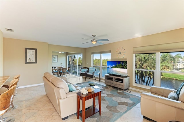 living room with ceiling fan