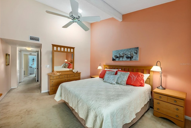 carpeted bedroom with beam ceiling, high vaulted ceiling, and ceiling fan